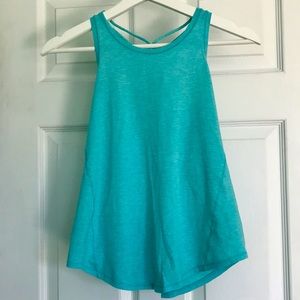 Ocean blue tank with cross cross detail on back